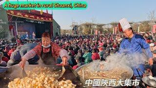 A huge market in rural Shaanxi, China, only once a year, with so many street food