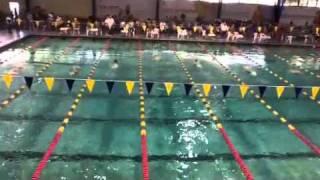 Tyler swims the 8 & under 25 butterfly = 1st place