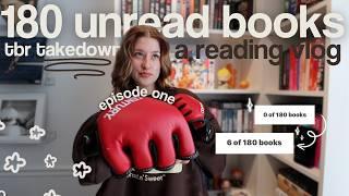 getting through my physical tbr..  tbr takedown episode one! *spoiler free reading vlog!*