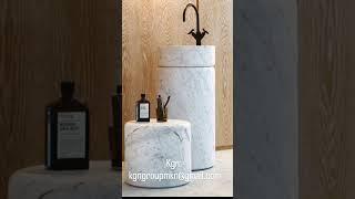 natural white marble pedestal washbasin.