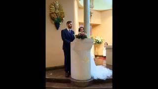 Bride sings to her new husband at wedding.