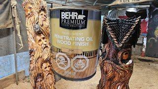 Finishing some outdoor wood carvings.