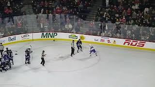 Laval Rocket's Riley McKay and Manitoba Moose's Jeff Malott get into a fight at the end of the game