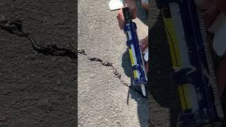 Filling Cracks In Asphalt Driveway