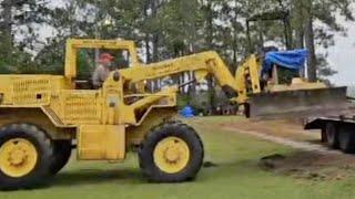 SOLD $1500 KOMATSU !  FIRST TIME UNLOADING  LIKE THIS!!!!