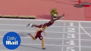 Hurdler Infinite Tucker dives over finishing line to win race