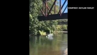 Investigation after video shows 4-year-old tossed off bridge