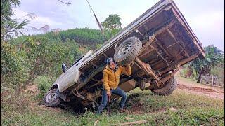 I happened to find a truck stuck on the side of the road, about to fall off a cliff.