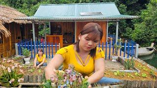 The girl completed the flower garden floating on the water.