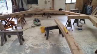 Green oak timber frame sling braces truss time lapse