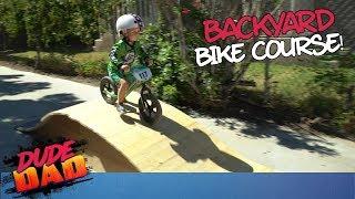 Toddler slays epic backyard bike course!