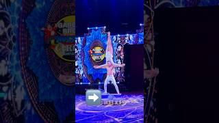 Circus Duo Stuns Crowd with Balancing Act on Rolling Board