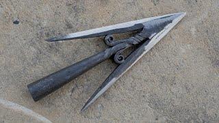 Forging decorated medieval arrowhead. Blacksmithing