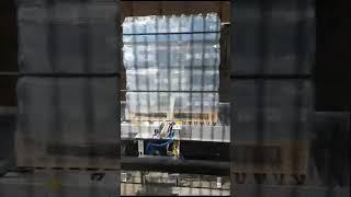 Транспортная упаковка поддонов с бутилированной водой