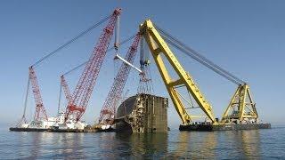 Salvage of sunken car carrier Tricolor