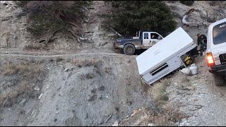 Trailer goes off a cliff and so do we. This recovery was sketchy.