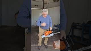 Showing Chinese Boss how to Use 881 Stihl Chainsaw: warning dangerous lack of safety equipment.