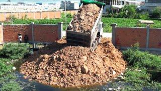 Total Video Excellent Process Komats'u Bulldozer Push Soil Near The Fence In Construction Site