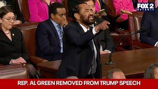 Rep. Al Green removed from House chambers during Trump speech