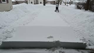 Shoveling two Michigan storms.