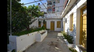 HAGN104- Town house with beautiful courtyard and sea views.