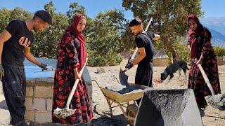 Nomadic life: The hard work of a nomadic couple: Completing the stairs of a nomadic house