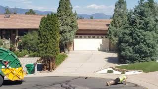 Garbage man getting in some exercise