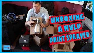 Unboxing a QTech 5 HVLP paint sprayer.