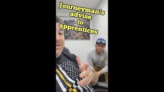 Journeyman gives advice to apprentice electrician