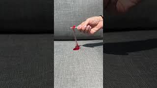 Staining my couch with a melted lollipop to see if it’s really stain proof!!