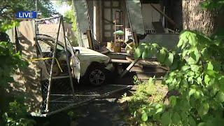 Car plows into house in Jefferson Park while driver flees police