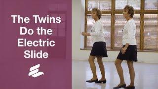 Dancing: The Twins do the Electric Slide