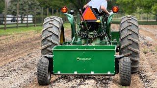 Organic Fertilizer Spreader on Vegetable Rows