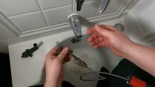 Using The DrainX Snake Augur To Fix A Slow Draining Bathtub