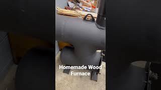 DIY Wood Burning Furnace heats ENTIRE GARAGE! #shorts #woodworking #fabrication #wood #fireplace