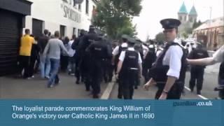 Orangemen parade through Belfast's Ardoyne district