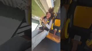 Trying to use a mobile phone on a roller coaster