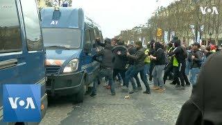 Violence Marks 18th Round of Protests as Police and "Yellow Vests" Clash