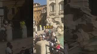 Tourist fills water bottle in Rome's Trevi Fountain #trending #viral #trend #youtube #tiktok