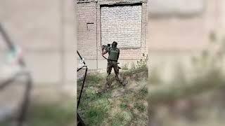 Ukrainian soldier fires with Milkor M32A1 MSGL 40mm Multi Shot Grenade Launcher