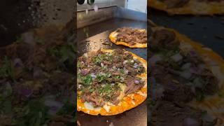 Birria taco pizza from Chingon.