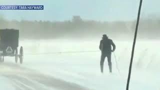 Amish man caught on video skiing behind a horse and buggy