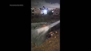 Video shows missile fragments on ground in occupied West Bank, after Iran launches barrage at Israel