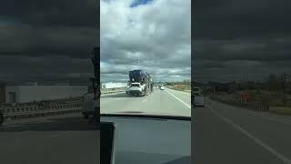 How I captured this truck ferrying cars to the port in the city of Ottawa , Canada.