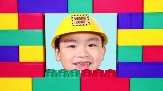 Lyndon Pretend Play as a Builder with Jumbo Blocks