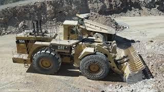 Huge Caterpillar 994 Wheel Loader Loading Caterpillar 777F Dumpers - Samaras Mining Group