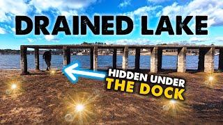 Metal Detecting Old Swimming Hole At Drained Lake! Watch What Was Hidden Under The Dock!