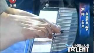 guy with no arms plays piano and wins China's Got Talent