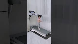 The girl plays treadmill too six  not the kui is dad brought up