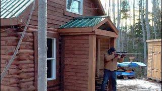 Log cabin built in the north￼.Wolf or a coyote stalked me all day in the north wilderness ￼Canadian